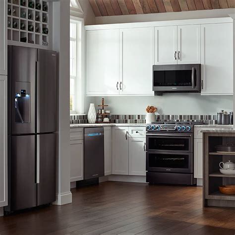 slate appliances and kitchen cabinets